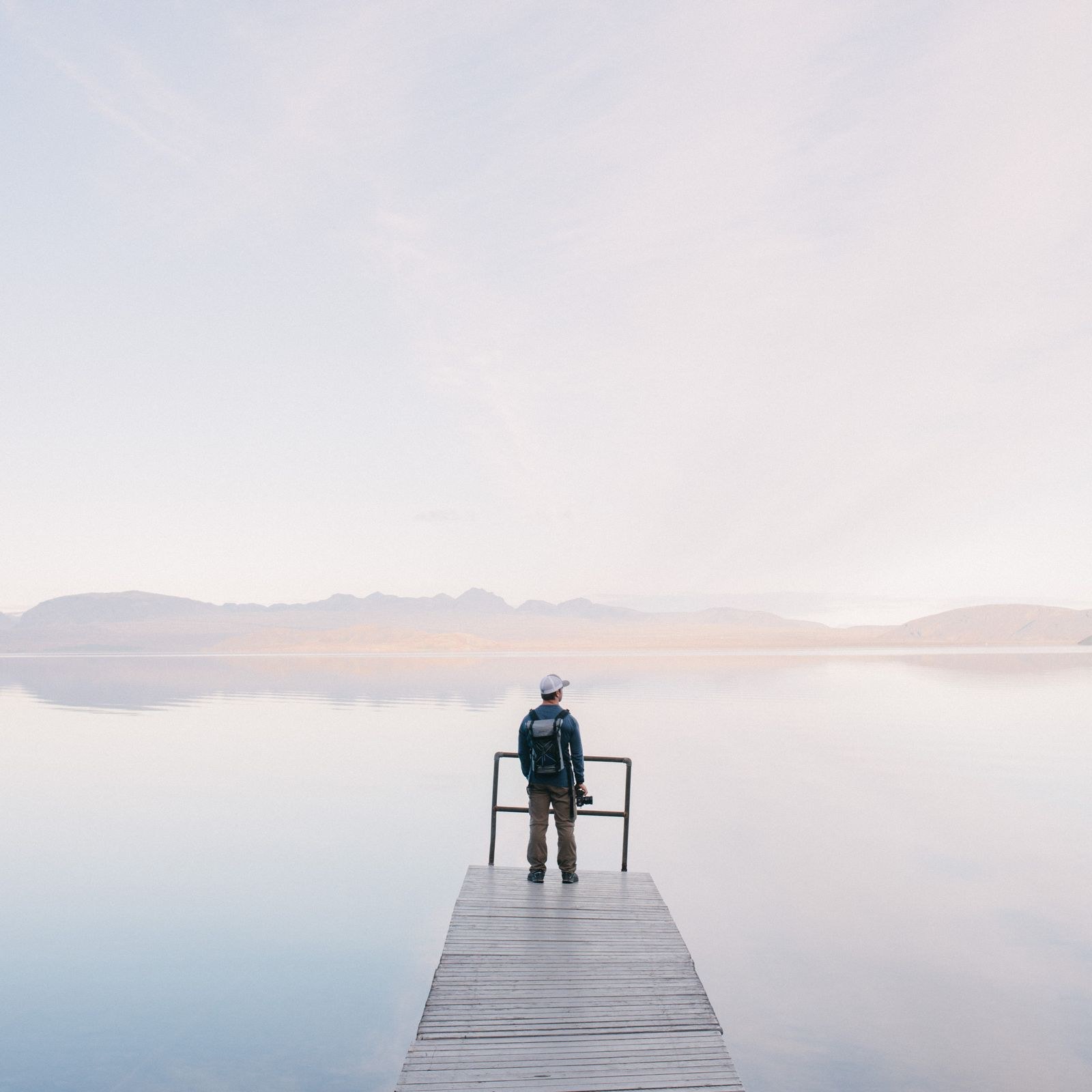 Editor framing a shot with a camera on location